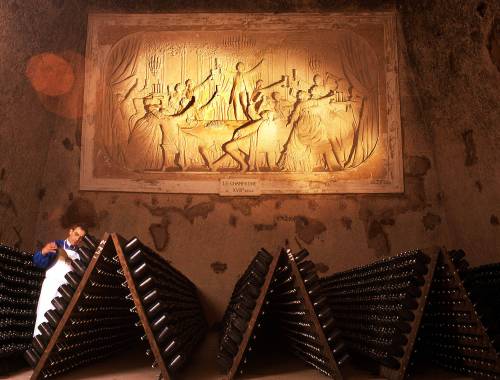 Michel Spingler / Associated Press files
                                During traditional method sparkling wine production, as seen here at champagne producer Pommery in Reims, bottles are racked in an inverted position and occasionally gently shaken/twisted in a process called riddling, which sends the spent yeast cells towards the bottle&rsquo;s neck. The neck is then frozen, the plug of dead yeast cells removed, and the bottles topped up and re-sealed.