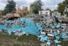 Ruth Bonneville / Free Press
                                Crews work on demolishing Happyland outdoor pool on Marion Street, Thursday. In an attempt to convince city council to keep the pool open for another season, area residents raised $86,000 last year to go toward the pool’s operating costs. Instead, council cast a final vote to close the facility.