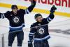 JOHN WOODS / WINNIPEG FREE PRESS
                                Winnipeg Jets’ Danny Zhilkin (53) and Kevin He (46) celebrate Zhilkinճ goal against the Minnesota Wild during first period pre-season NHL action in Winnipeg on Sunday, September 21, 2025.