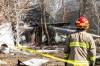 MIKAELA MACKENZIE / FREE PRESS
                                Firefighters at the scene of a vacant building fire on Magnus Avenue, near Arlington Street.