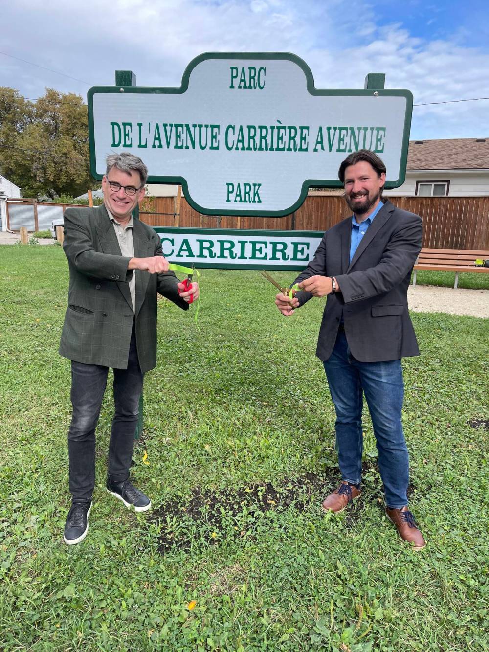 INSTAGRAMSt. Vital Coun. Brian Mayes (left) and St. Boniface Coun. Matt Allard at the official opening of Carriere Avenue Park in September 2024. The councillors have withdrawn a motion to rename the park after astrophysicist and astronomer James Peebles.
