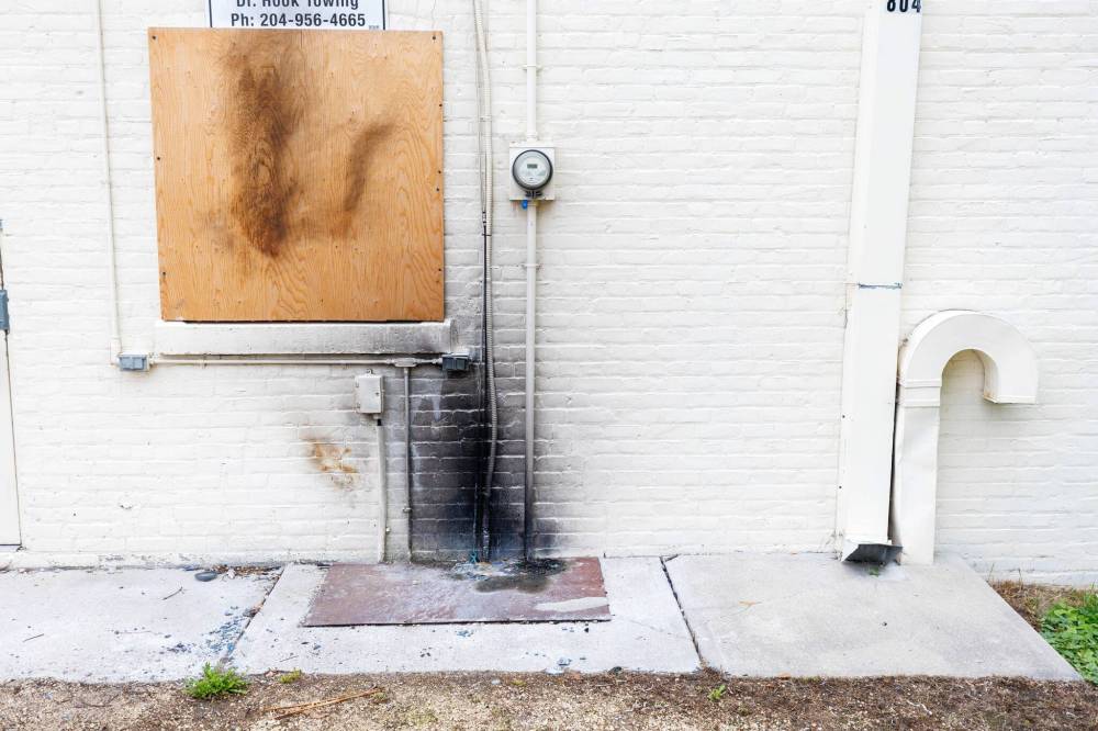 MIKE DEAL / FREE PRESS
Damage at the rear of NDP cabinet minister Bernadette Smith’s Point Douglas constituency office, which has been hit by several fires recently. Police are investigating.