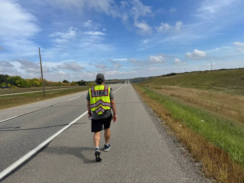 SUPPLIED
Portage la Prairie firefighter Andrew Cherkas walked 292 kilometres across Manitoba as part of his Steppin’ in Support for 1977 fundraiser. When injury prevented him from completing the walk, 10 firefighters stepped in to finish it.
