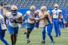 MIKE DEAL / FREE PRESS
                                Bombers QB Zach Collaros (right) hands the ball off to Nic Demski on Tuesday during practice at Princess Auto Stadium.