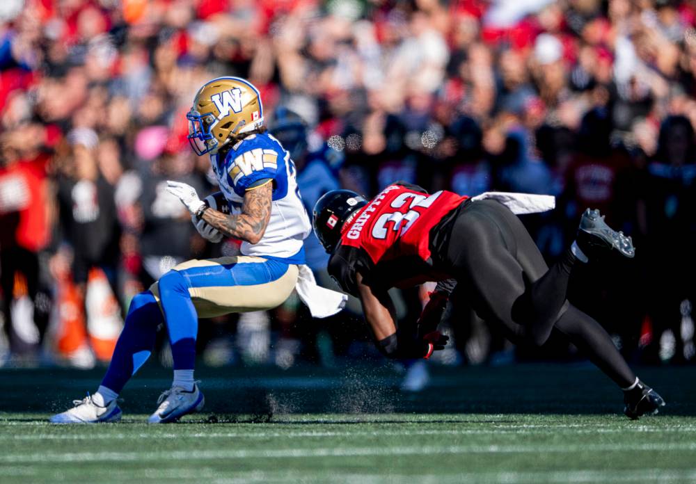 Spencer Colby / THE CANADIAN PRESS
Winnipeg Blue Bombers rookie Trey Vaval makes Ottawa Redblacks linebacker Jayden Griffiths miss last Saturday in the nation’s capital.
