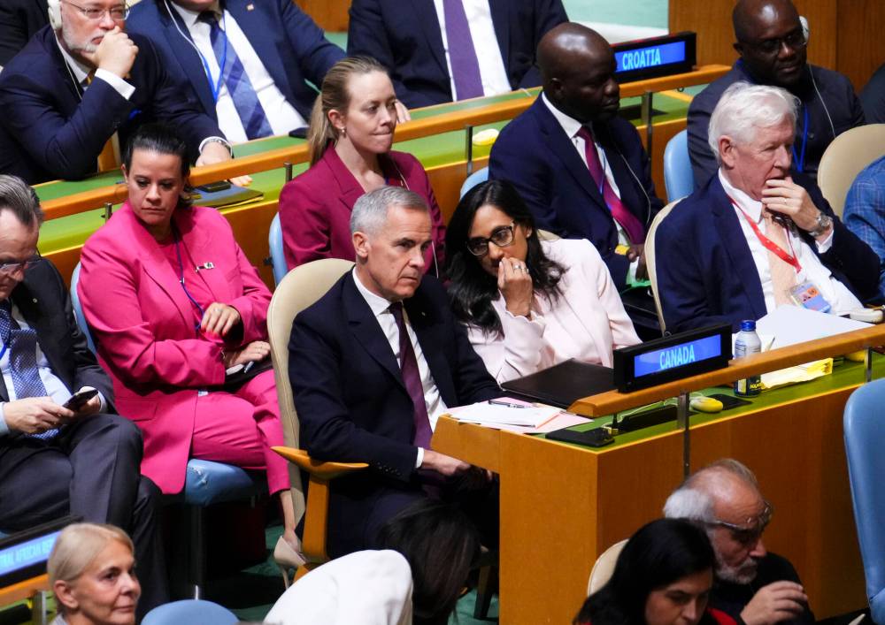 SEAN KILPATRICK / THE CANADIAN PRESS FILES
Prime Minister Mark Carney sits beside Anita Anand, minister of foreign affairs, as they take part in a high-level international conference for the peaceful settlement of the question of Palestine and the implementation of the two-state solution during the United Nations General Assembly (UNGA) in New York on Sept. 22.