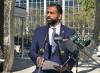 RUTH BONNEVILLE / FREE PRESS
                                Obby Khan answers questions from the media outside the Law Courts on Friday.