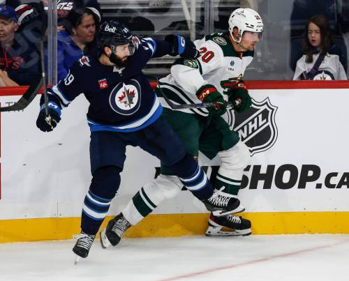 JOHN WOODS / FREE PRESS
                                Winnipeg Jets forward Phillip Di Giuseppe (left) is thrilled to be getting a fresh start with the club.