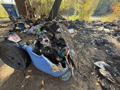 Scott Billeck / Winnipeg Free Press
                                A fire at an encampment along the Assiniboine River near Spence Street and Balmoral Street destroyed a tent, sleeping bag and other belongings of a homeless resident. &lsquo;I&rsquo;ll be fine,&rsquo; the woman said.