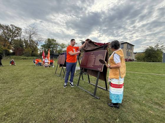 More than 100 people gathered Tuesday at 621 Academy Rd., on the National Day for Truth and Reconciliation, for a ceremony unveiling three plaques near a former residential school. (Scott Billeck / Free Press)
