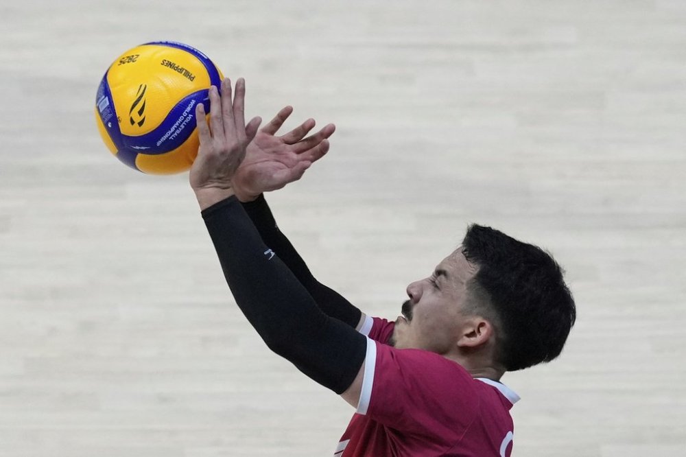 Landon Currie of Canada hits the ball against Japan during their pool phase match at the 2025 FIVB Volleyball Men's World Championship in Quezon city, Philippines on Monday, Sept. 15, 2025. (AP Photo/Aaron Favila)