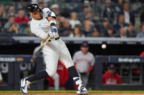 New York Yankees Aaron Judge connects for an RBI single against the Boston Red Sox during the fifth inning of Game 2 of an American League wild-card baseball playoff series, Wednesday, Oct. 1, 2025, in New York. (AP Photo/Frank Franklin II)