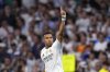 Real Madrid's Kylian Mbappe celebrates after scoring his side's second goal during a Champions League opening phase soccer match between Real Madrid and Marseille at Santiago Bernabeu stadium, in Madrid, Tuesday, Sept. 16, 2025. (AP Photo/Manu Fernandez)