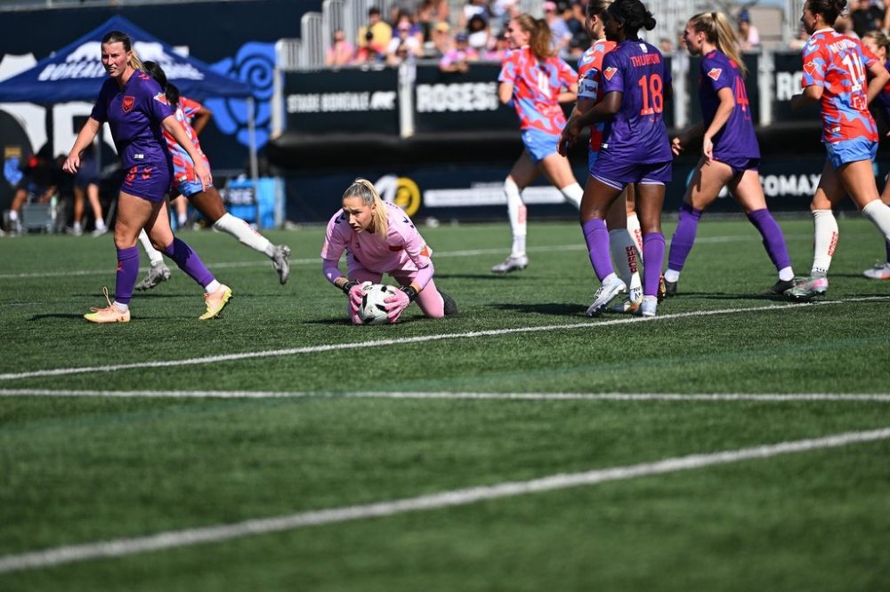 Montreal Roses FC goalkeeper Anna Karpenko guards the ball during the Roses' game against Calgary Wild FC, in Montreal, in a Saturday, Sept. 27, 2025, handout photo.THE CANADIAN PRESS/Handout - Calgary Wild FC, Tim Austen (Mandatory Credit)