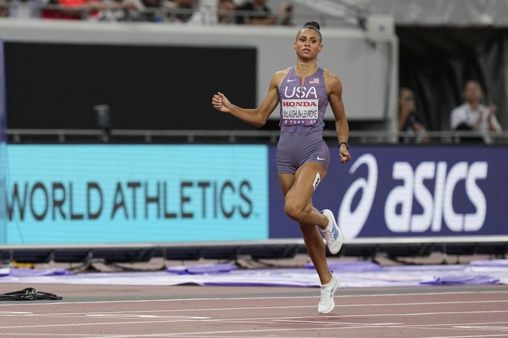 United States' Sydney McLaughlin-Levrone competes in the women's 400 meters semifinal at the World Athletics Championships in Tokyo, Tuesday, Sept. 16, 2025. (AP Photo/Eugene Hoshiko)