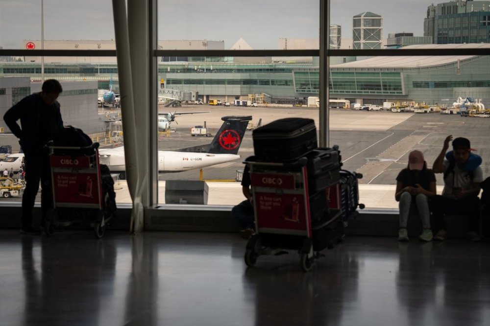 The Air Canada check-in area inside Terminal 1 of Toronto Pearson International Airport is pictured in Mississauga, Ont., on Wednesday, August 13 2025. THE CANADIAN PRESS/Arlyn McAdorey
