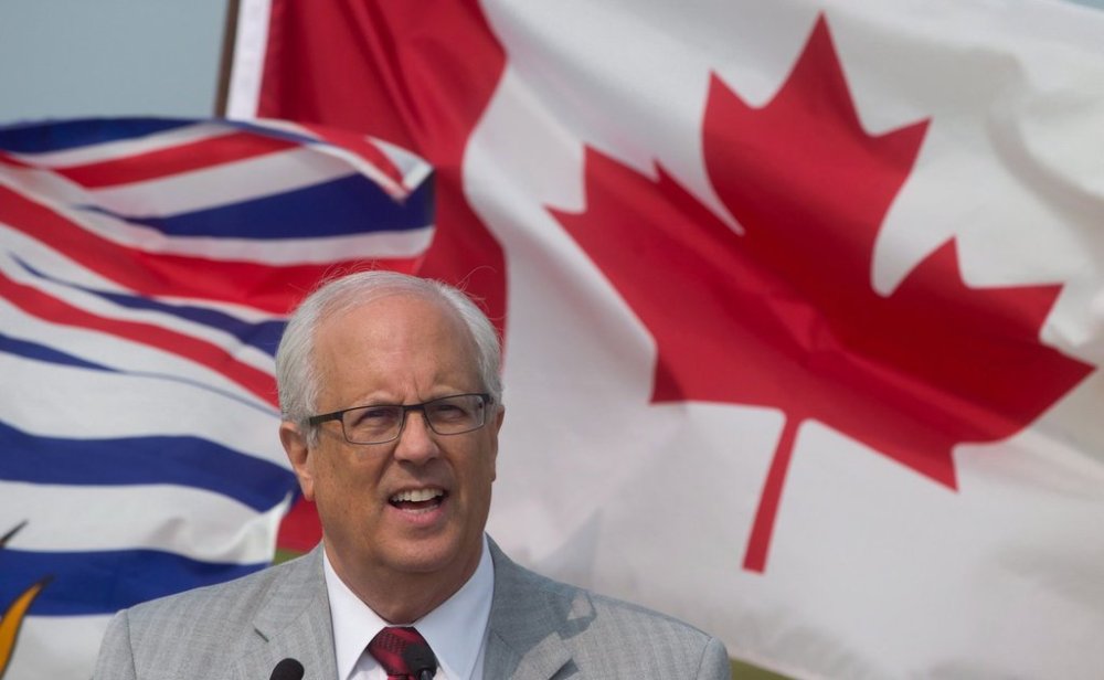 Richmond Mayor Malcolm Brodie speaks at a federal government announcement about roadway projects that will increase capacity to the Fraser River Port, in Richmond, B.C., on Tuesday July 7, 2015. The projects involve widening the area of Westminster Highway and Nelson Road and a portion of No. 6 Road. THE CANADIAN PRESS/Darryl Dyck
