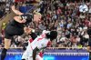 Manchester City's Erling Haaland, top, scores his side's second goal during the Champions League opening phase soccer match between Monaco and Manchester City at the Louis II stadium in Monaco, Wednesday, Oct. 1, 2025. (AP Photo/Philippe Magoni)