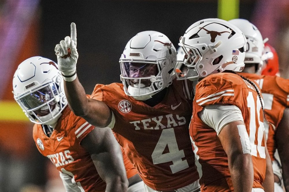 Texas Longhorns defensive back Jelani McDonald (4) celebrates a turnover on downs in the third quarter of the Texas Longhorns' game against the Sam Houston State Bearkats in Austin, Saturday, Sept. 20, 2025. (Sara Diggins/Austin American-Statesman via AP)