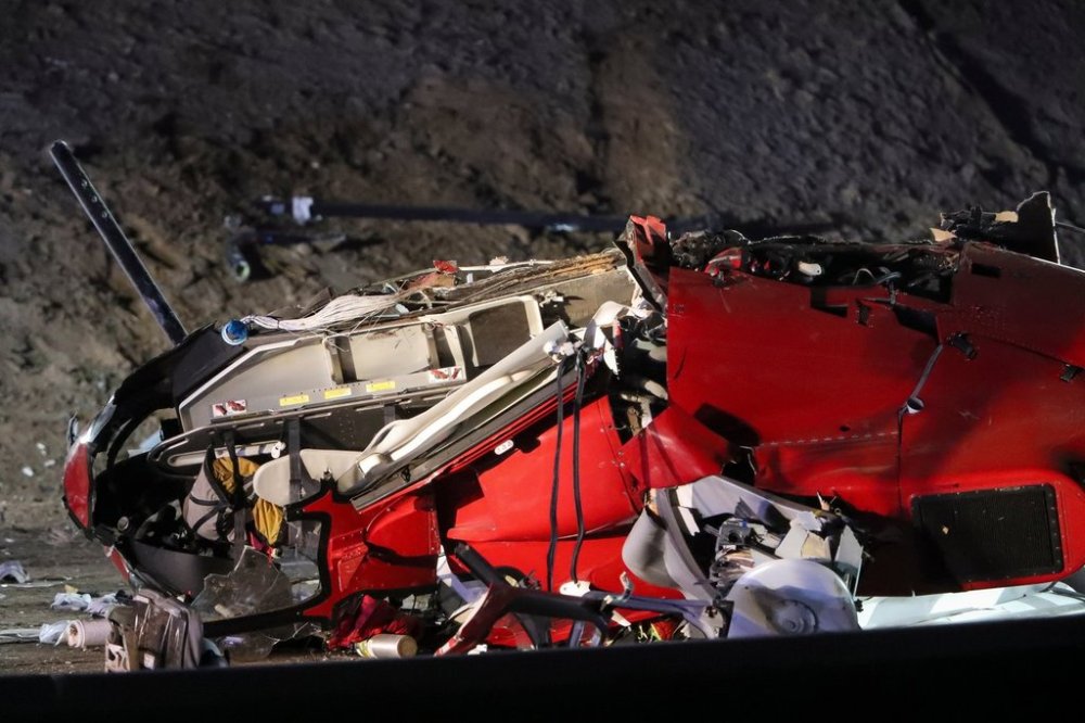 A medical helicopter is shown after it crashed on Highway 50 Monday, Oct. 6, 2025, in Sacramento, Calif. (AP Photo/Scott Marshall)