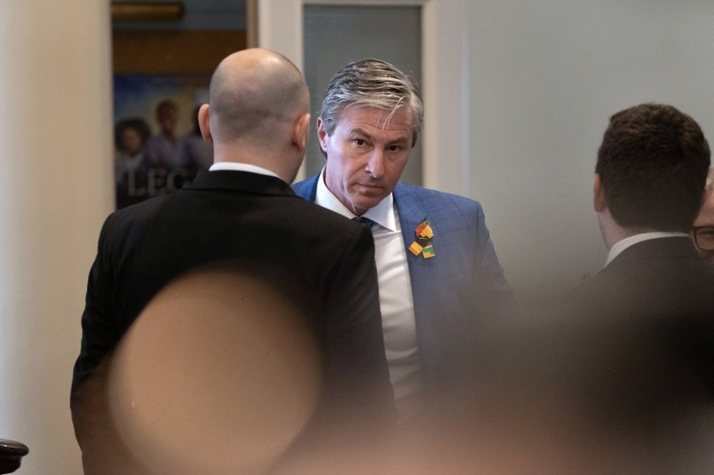 Nova Scotia Premier Tim Houston looks on at Province House following the speech from the throne in Halifax on Friday, Feb. 14, 2025. THE CANADIAN PRESS/Darren Calabrese