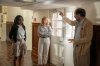 This image released by Amazon MGM Studios shows Ayo Edebiri, from left, Julia Roberts and director Luca Guadagnino on the set of 
