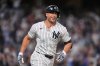 New York Yankees' Giancarlo Stanton smiles after hitting a two-run home run during the third inning of a baseball game against the Baltimore Orioles Friday, Sept. 26, 2025, in New York. (AP Photo/Frank Franklin II)
