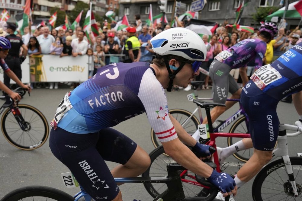 Pier-Andre Cote from the Israel Premier Tech team rides during the eleventh stage of the Spanish Vuelta cycling race, from Bilbao to Bilbao, Spain, Wednesday, Sept. 3, 2025. (AP Photo/Miguel Oses)