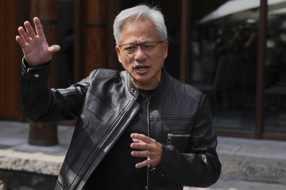 FILE - CEO of Nvidia Jensen Huang speaks during a press conference at the Mandarin Oriental Qianmen after attending the third China International Supply Chain Expo, in Beijing, July 16, 2025. (AP Photo/Andy Wong, File)