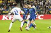 France's Desire Doue, left, challenges for the ball with Ukraine's Oleksii Hutsuliak during the 2026 FIFA World Cup qualifying soccer match between Ukraine and France at Tarczynski Arena in Wroclaw, Poland, Friday, Sept. 5, 2025. (AP Photo/Czarek Sokolowski)