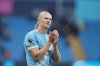 Manchester City's Erling Haaland walks off the pitch after the Premier League soccer match between Burnley and Manchester City in Manchester, England, Saturday, Sept. 27, 2025. (AP Photo/Jon Super)