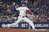 Toronto Blue Jays starting pitcher Kevin Gausman (34) throws to a Boston Red Sox batter in first inning American League baseball action in Toronto on Tuesday, Sept. 23, 2025. THE CANADIAN PRESS/Jon Blacker