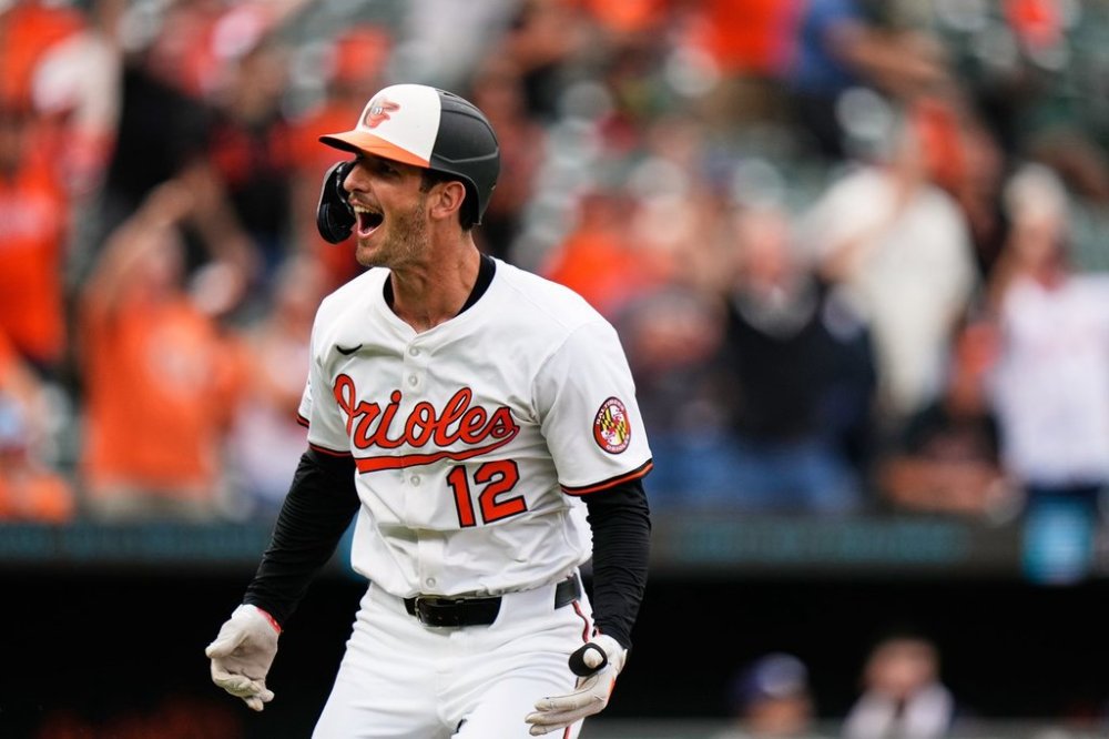 Baltimore Orioles' Dylan Beavers (12) reacts after hitting a walk-off home run in the ninth inning of a baseball game against the Tampa Bay Rays, Thursday, Sept. 25, 2025, in Baltimore. (AP Photo/Stephanie Scarbrough)