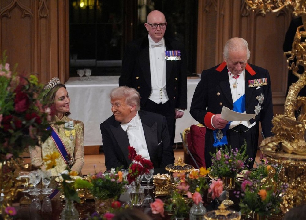 U.S. President Donald Trump, centre, and Kate, Princess of Wales, listens to Britain's King Charles during the State Banquet in Windsor Castle, England, on day one of U.S. President Donald Trump and First Lady Melania Trump's second state visit to the UK, Wednesday Sept. 17, 2025. (Yui Mok/PA via AP, Pool Photo via AP)