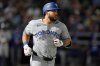 FILE - Toronto Blue Jays' Anthony Santander runs to first base after his single off Tampa Bay Rays pitcher Garrett Cleavinger during the sixth inning of a baseball game May 24, 2025, in Tampa, Fla. (AP Photo/Chris O'Meara, File)