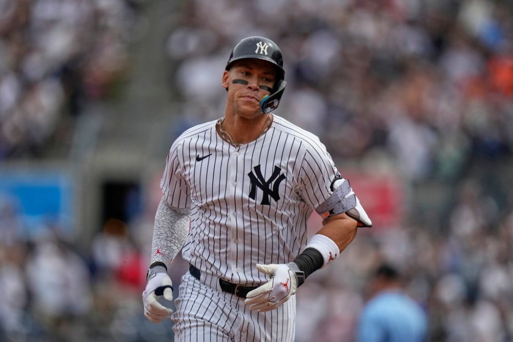 New York Yankees' Aaron Judge runs the bases after hitting a home run during the first inning of a baseball game against the Baltimore Orioles Saturday, Sept. 27, 2025, in New York. (AP Photo/Frank Franklin II)
