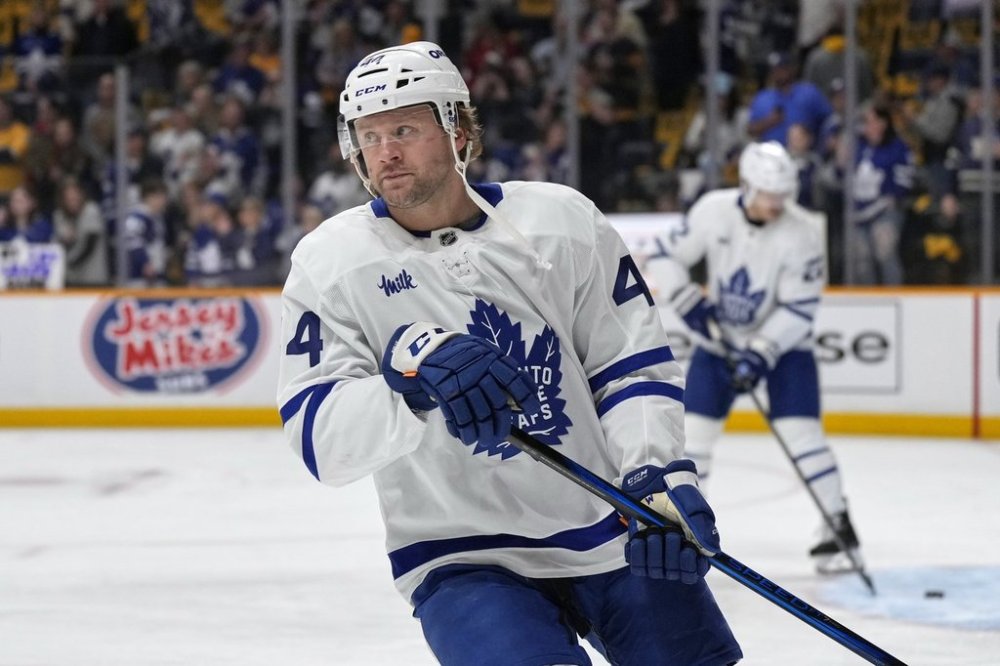 Toronto Maple Leafs defenceman Morgan Rielly warms up before a game against the Predators on Saturday, March 22, 2025, in Nashville, Tenn. (AP Photo/George Walker IV)