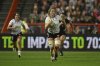 Canada's Sophie de Goede controls the ball the Women's Rugby World Cup 2025 semifinal match between New Zealand and Canada in Bristol, England, Friday, Sept. 19, 2025.(AP Photo/Anthony Upton)