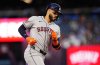 Houston Astros' Carlos Correa (1) rounds the bases after hitting a two-run home run against the Toronto Blue Jays during first inning MLB baseball action in Toronto on Tuesday, Sept. 9, 2025. THE CANADIAN PRESS/Nathan Denette