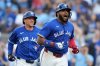 Toronto Blue Jays' Vladimir Guerrero Jr. (27) rounds the bases after hitting a grand slam off New York Yankees pitcher Will Warren (98) during fourth inning MLB American League Division Series baseball action in Toronto, Sunday, Oct. 5, 2025. THE CANADIAN PRESS/Nathan Denette