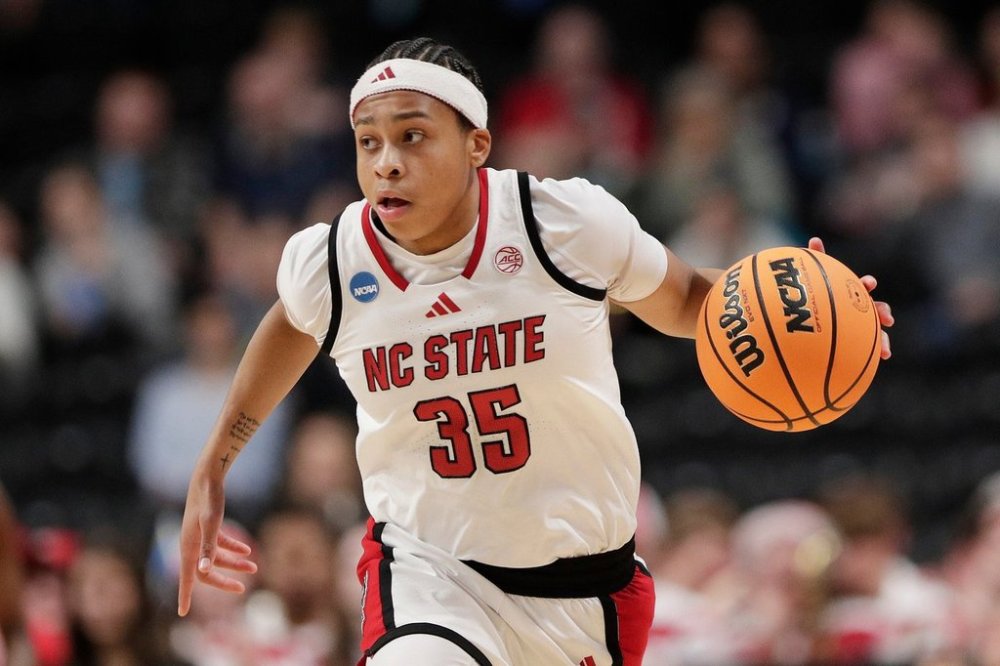 FILE - North Carolina State guard Zoe Brooks controls the ball during the first half against LSU in the Sweet 16 of the NCAA college basketball tournament March 28, 2025, in Spokane, Wash. (AP Photo/Young Kwak, File)