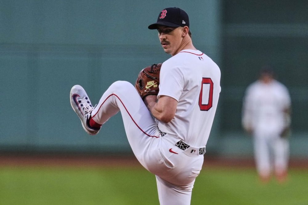 Boston Red Sox pitcher Walker Buehler delivers during the first inning of a baseball game against the Baltimore Orioles at Fenway Park, Tuesday, Aug. 19, 2025, in Boston. (AP Photo/Charles Krupa)