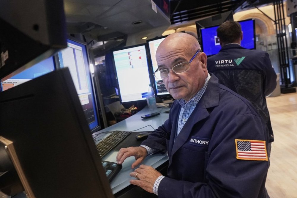 Trader Anthony Confusione works on the floor of the New York Stock Exchange, Wednesday, Sept. 17, 2025. (AP Photo/Richard Drew)