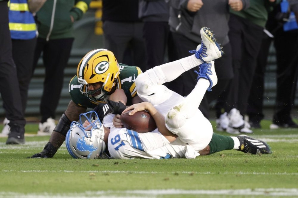 Green Bay Packers defensive end Micah Parsons (1) sacks Detroit Lions quarterback Jared Goff (16) during the second half of an NFL football game Sunday, Sept. 7, 2025, in Green Bay, Wis. (AP Photo/Matt Ludtke)