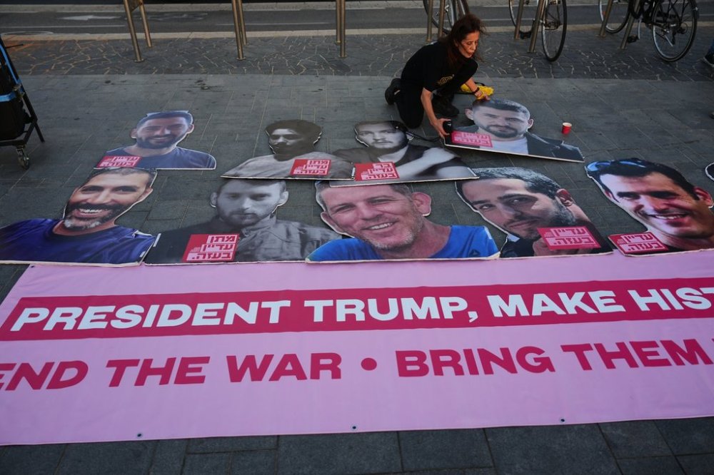 Relatives and supporters of hostages held by Hamas in the Gaza Strip calling for their immediate release and an end of the ongoing war, in front of the U.S. Embassy branch office in Tel Aviv, Israel, Monday, Sept. 29, 2025, During the meeting between U.S. President Donald Trump and Israeli Prime Minister Benjamin Netanyahu in the White House. (AP Photo/Ariel Schalit)