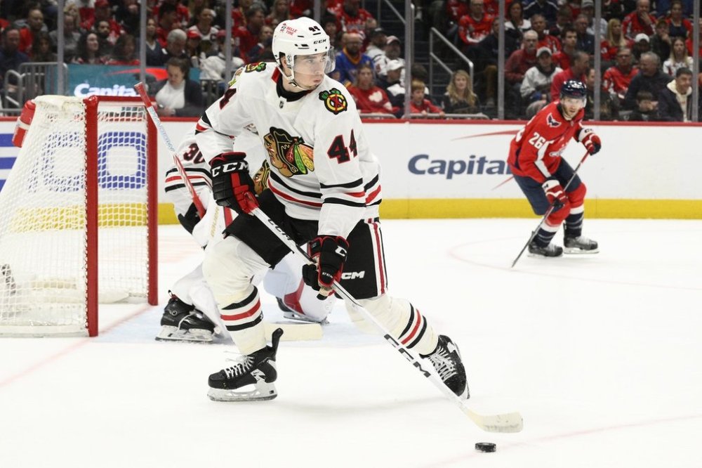 FILE - Chicago Blackhawks defenseman Wyatt Kaiser (44) in action during the first period of an NHL hockey game against the Washington Capitals, Friday, April 4, 2025, in Washington. (AP Photo/Nick Wass, File)