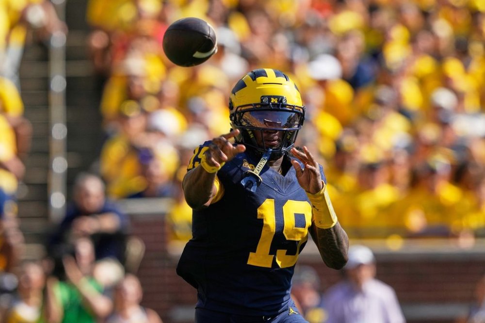Michigan quarterback Bryce Underwood throws a pass during the first half of an NCAA college football game against Wisconsin, Saturday, Oct. 4, 2025, in Ann Arbor, Mich. (AP Photo/Ryan Sun)