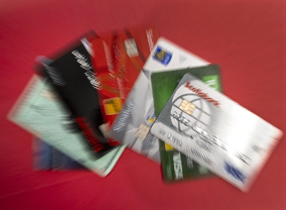 Credit cards shown on Thursday, Oct. 6, 2022. Statistics Canada says the amount Canadians owe relative to their income ticked higher in the second quarter as debt grew faster than income. THE CANADIAN PRESS/Andrew Vaughan