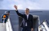 Prime Minister Mark Carney waves as he boards a government plane to head home from Riga, Latvia on Wednesday, Aug. 27, 2025. THE CANADIAN PRESS/Christinne Muschi
