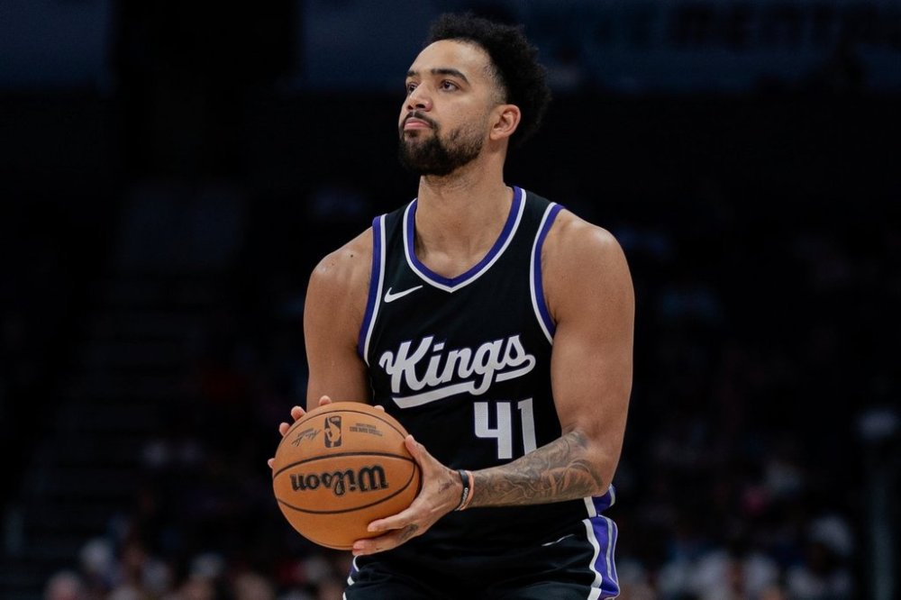 FILE - Sacramento Kings forward Trey Lyles (41) shoots the ball against the Charlotte Hornets during the second half of an NBA basketball game Friday, April 4, 2025, in Charlotte, N.C. (AP Photo/Jacob Kupferman, File)